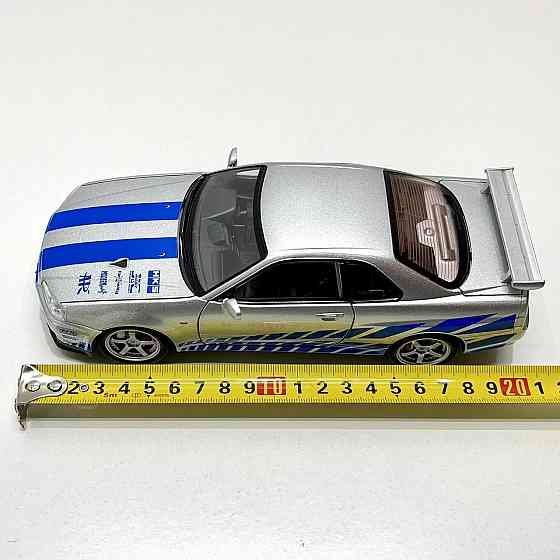 Машинка металева Авто Експерт Nissan GT-R 1:24 світло/звук відчиняються двері капот багажник Сіра (1990-21) Чернігів