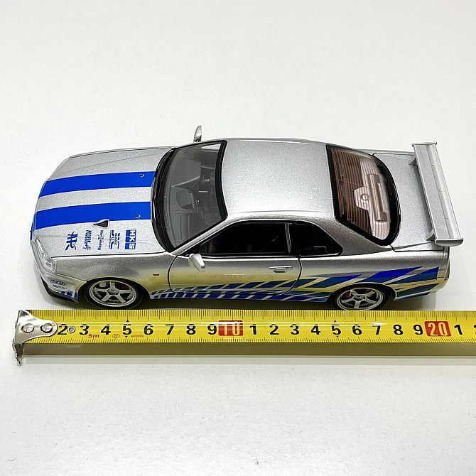 Машинка металева Авто Експерт Nissan GT-R 1:24 світло/звук відчиняються двері капот багажник Сіра (1990-21) Чернігів - фото 6