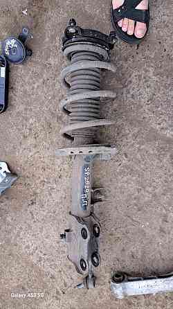 Оригинальная передняя стойка в сборе (амортизатор, пружина, опора) на Kia Sportage 2016–2021 годов. Киев