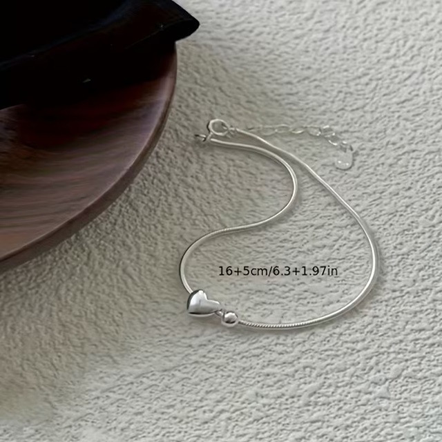 Женский браслет с серебристой подвеской-сердцем – минималистичный браслет из нержавеющей стали Киев - изображение 5