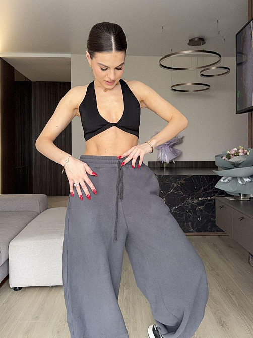 Женские теплые объемные брюки 