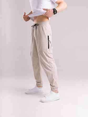 Бежеві чоловічі джогери. Джогери плащівка спорт чоловічі Pobedov Yoxo. Штани джогери з кишенями Київ