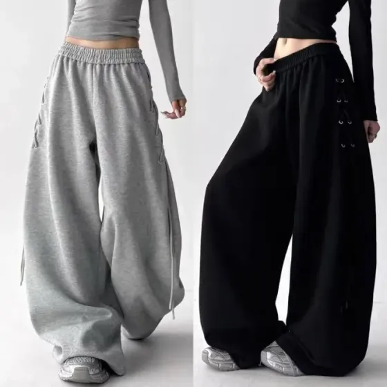 Теплые женские спортивные штаны оверсайз на флисе со шнуровкой по бокам снизу на затяжках Харьков