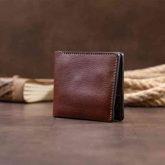 Горизонтальне портмоне в гладкій шкірі на магнітах GRANDE PELLE 11308 Коричневе Київ