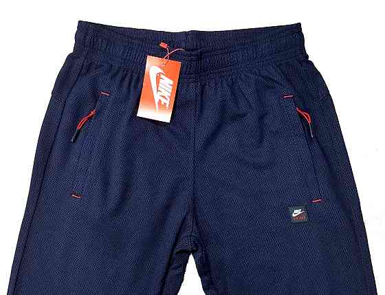 Мужские зауженные штаны Nike,капа Киев