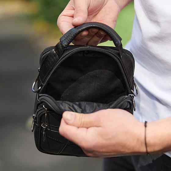 Мужская сумка-барсетка кожанная черная Tiding Bag 32051 Каменское