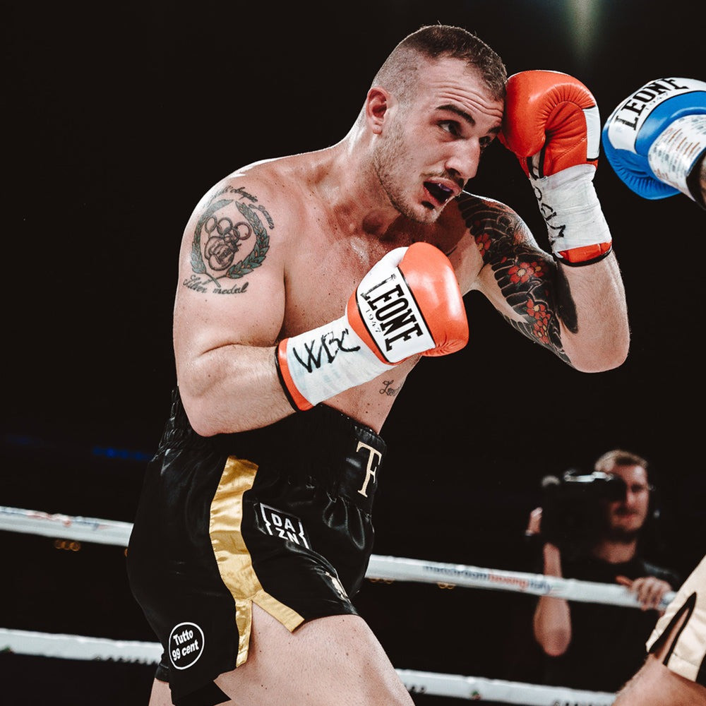 Боксерські рукавиці Leone GN047 SHOCK Red 12 унцій (бинти 4 м. в комплекті) Каменское - изображение 9