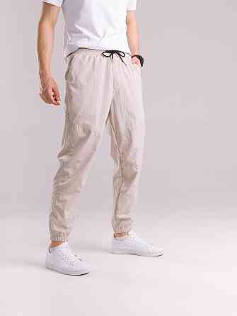 Бежеві чоловічі джогери. Джогери плащівка спорт чоловічі Pobedov Yoxo. Штани джогери з кишенями Київ