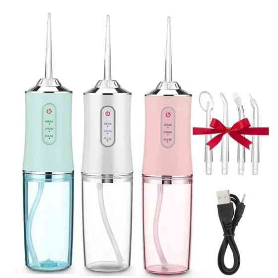 Іригатор ORAL IRRIGATOR з насадками, регулюванням тиску та зручністю для щоденної гігієни зубів Київ