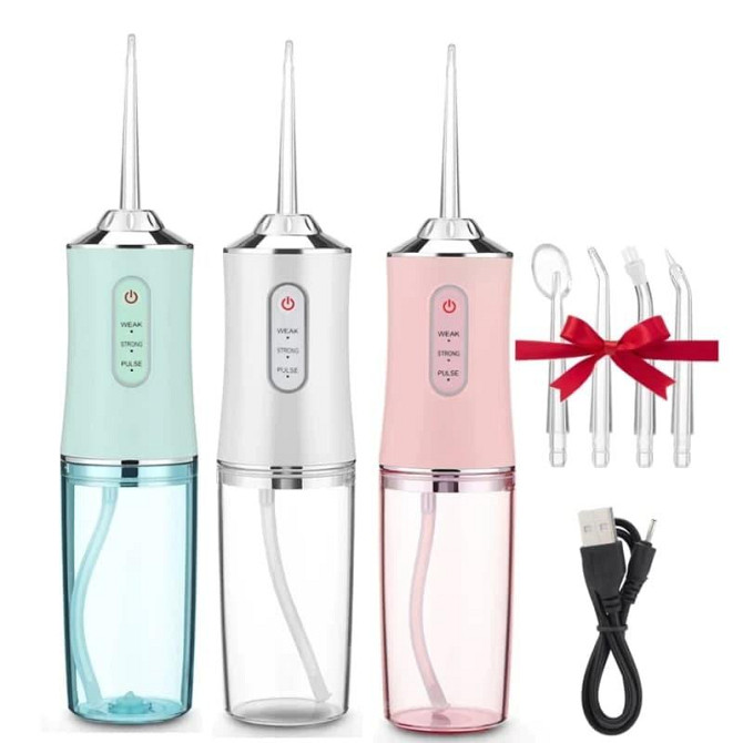 Иригатор ORAL IRRIGATOR с насадками, регулировкой давления и удобством для ежедневной гигиены зубов Киев - изображение 2