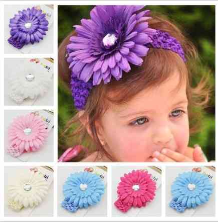 Помаранчева дитяча пов'язка з квіткою - розмір універсальний (на резинці), квітка 11см Київ