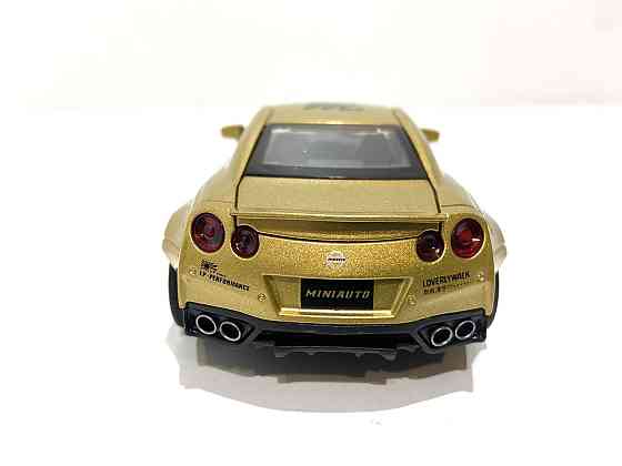 Машинка TK Union Nissan GTR "Auto Expert" металева, світло, звук, інерційна 38071 помаранчева Чернігів