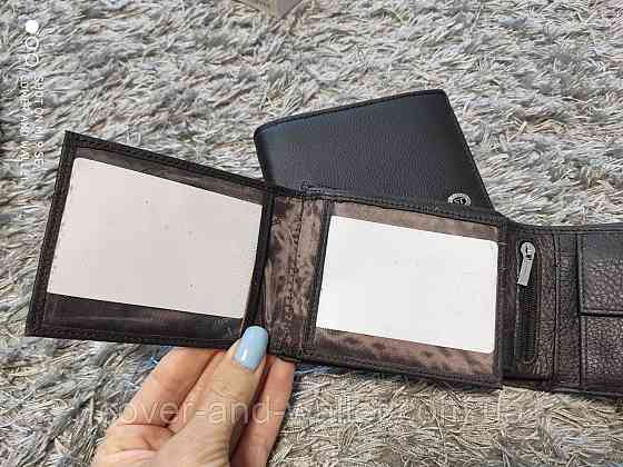 Зручне чоловіче портмоне без застібки коричневого кольору ST Leather Київ