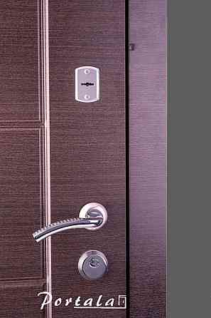 Двери квартирные, серия Элегант, модель Токио, гнутый профиль, 2 контура уплотнения, 2 замка Киев