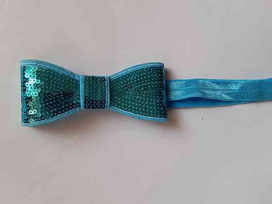 Пов'язка дитяча блакитного кольору з паєтками - бант близько 10см, окружність 36-48см Київ