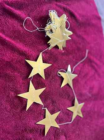 Гірлянда зірочки на нитці матові 4 м на 10 см золотистий Київ