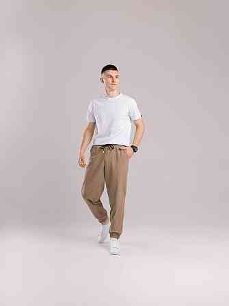 Чоловічі штани джогери з плащівки бежеві з кишенями Pobedov Ground Київ