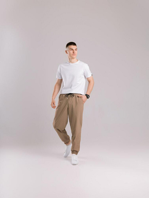 Чоловічі штани джогери з плащівки бежеві з кишенями Pobedov Ground Київ - фото 6