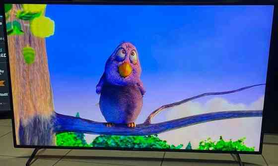 Телевизор Безрамный: 65