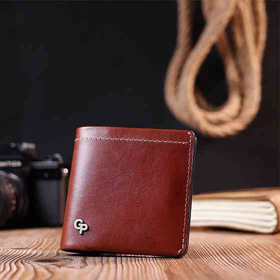 Чудовий шкіряний чоловічий гаманець Коричневий (GRANDE PELLE) Київ