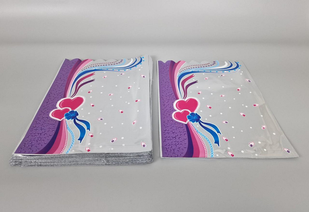 Пакет з малюнком для пакування подарунків (25 * 35) No426 фольгований (ажурний) "Серця" (100 шт) Харків - фото 1