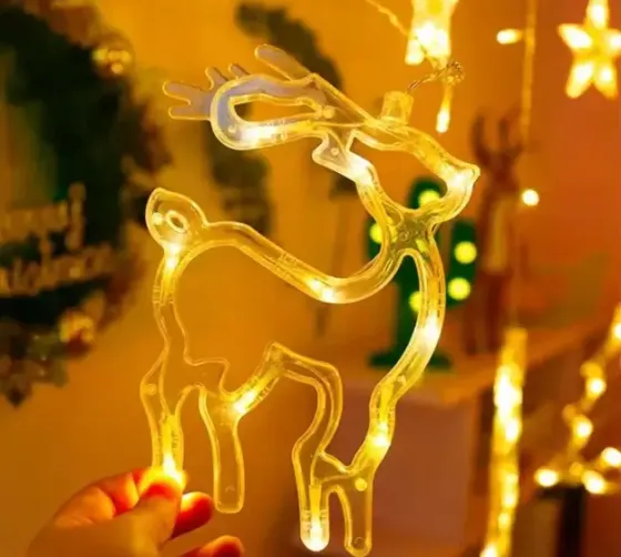 Гирлянда Штора с формами колокольчик, елка, олень 12 PCS light Коломия