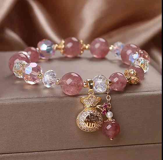 Браслет «Щасливий талісман» з рожевими намистинами та підвіскою Київ