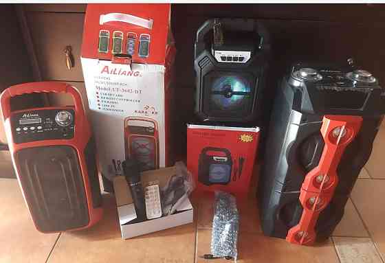 Колонка нова з мікрофоном та пультом. Киев