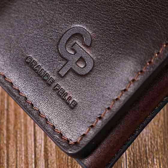 Зручний чоловічий гаманець у три складання GRANDE PELLE 16787 Темно-коричневий Київ