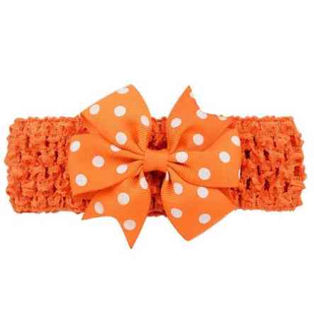 Дитяча помаранчева пов'язка з бантом в горох - розмір універсальний (на резинці), бант 8см Київ
