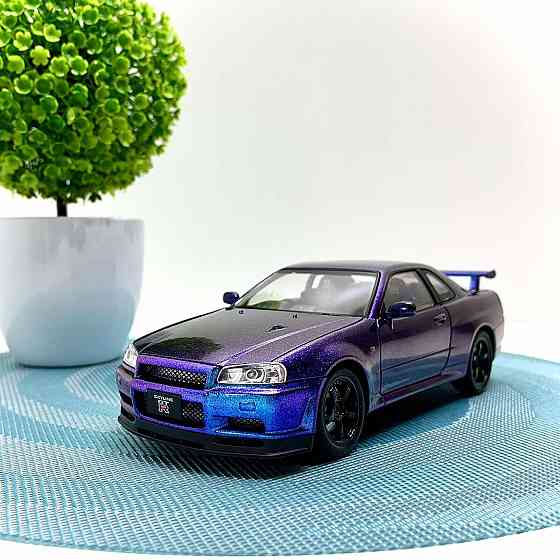 Машинка металева Авто Експерт Nissan GT-R 1:24 світло/звук відчиняються двері капот багажник Фіолетова (1990-21) Чернігів