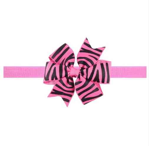 Розовая детская повязка с принтом зебры - размер универсальный (на резинке), бантик 8см Киев