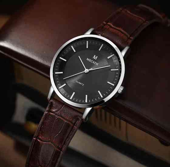 Подарочный набор для мужчин: наручные часы с 4 ориг. браслетами- диам 4см, длин 24см, шир рем 2см, без коробки Киев