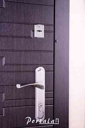 Двери квартирные, серия Комфорт, модель Эстепона, на трубе венге темный/венге светлый, 2 замка Киев