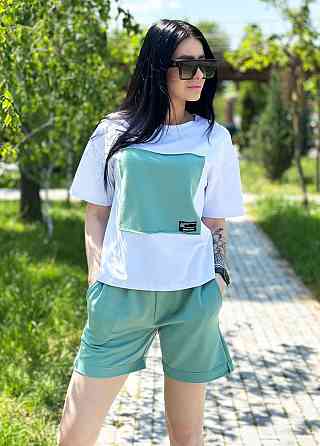 Двокольоровий костюм з шортами "Numb" оптом | Норма | Розпродаж моделі Фісташковий, 46-48 Київ