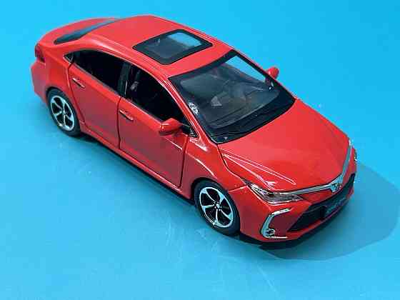 Машинка металева Авто Експерт Toyota Corolla 1:32 метал світло/звук Червона (GT-6258) Чернігів