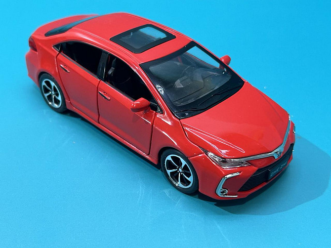 Машинка металева Авто Експерт Toyota Corolla 1:32 метал світло/звук Червона (GT-6258) Чернігів - фото 1