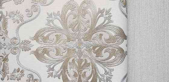 Обои виниловые на флизелине AdaWall Seyyah 1.06х10 вензеля цветы фигуры структурные золото серебро на белом Киев
