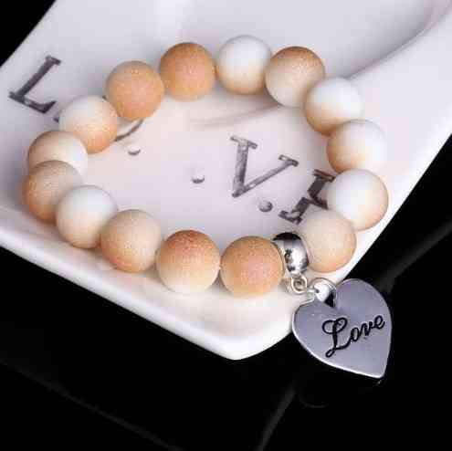 Женский браслет с сердечком бежевый Киев