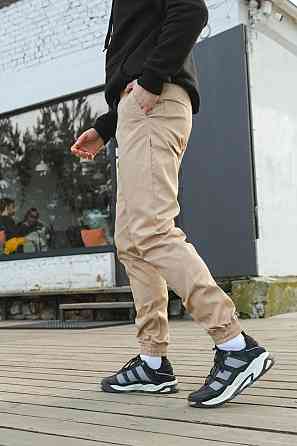 Чоловічі штани карго Intruder Штани карго з кишенями на манжетах Бавовна бежеві Одеса