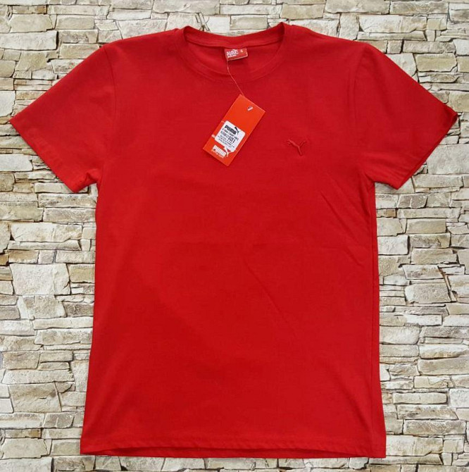 Жіноча однотонна трикотажна футболка Puma Суми - фото 2