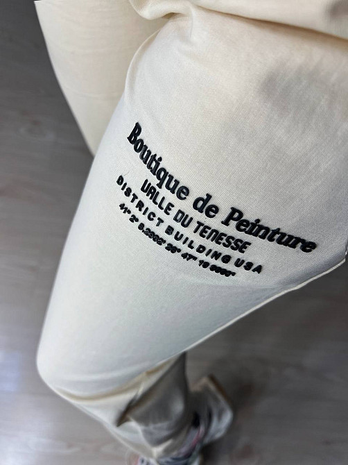 Костюм жіночий CAPPITONE 3161 оверсайз футболка та джогери з написом бежевий, бежевий, L Київ - фото 16