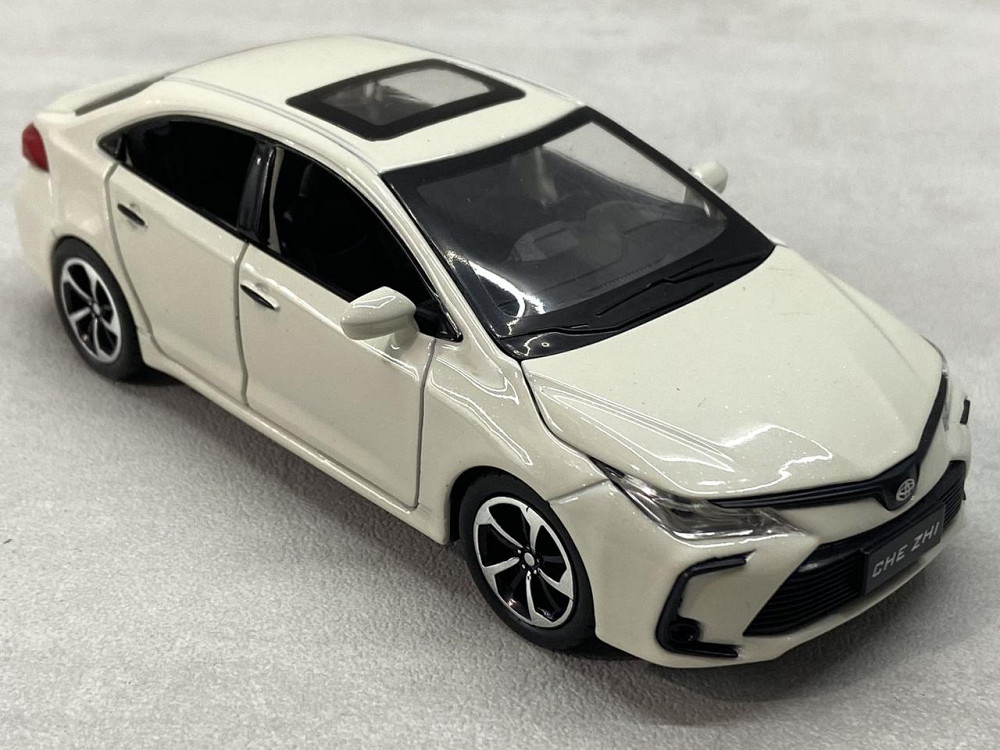Машинка TK Union Group Toyota Corolla інерційна 1:32 Біла (GT-6258) Чернігів - фото 1