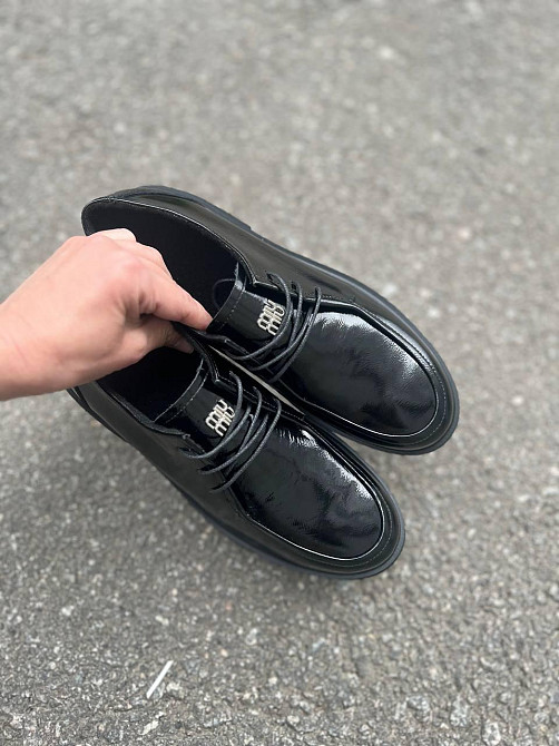Notta bene Стильні топсайдери жіночі з натуральної лакованої шкіри на низькому ходу чорні деміс Коломия - фото 4