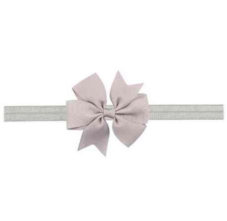 Дитяча сіра пов'язка з бантиком - на резинці, окружність від 30см до 48см, бант 9см Київ