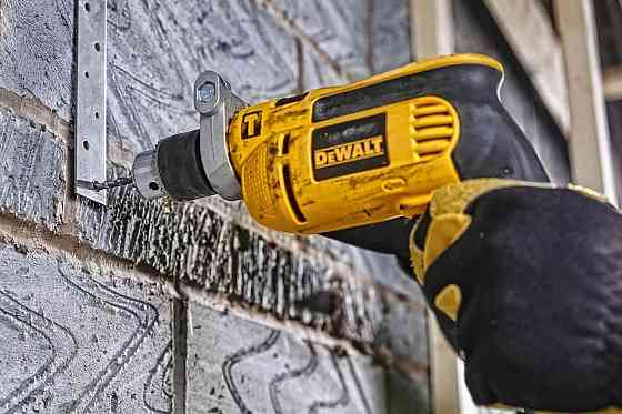 Дриль мережева ударна DeWALT DWD024 Київ