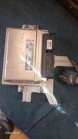 Блок керування двигуном + іммобілайзер Hyundai Tucson Київ