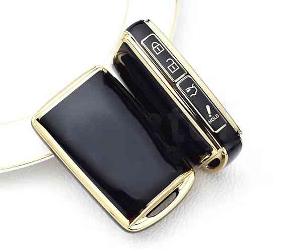 Захисний чохол для автомобільного ключ Mazda на 4 кнопки Чорний із золотистим Сміла