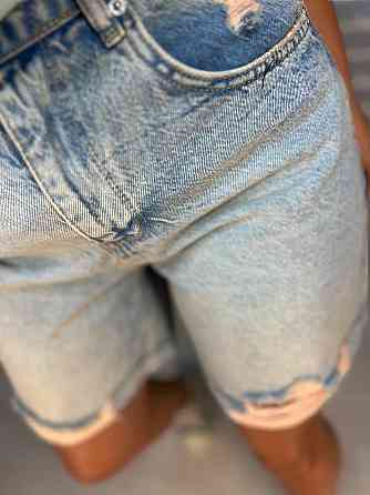 Шорты джинсовые женские Women Denim 355-973 средняя длина рваные снизу светло голубые, светло-голубо Одесса