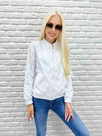 Жіноча вітровка з щільної плащівки "Leland" оптом | Розпродаж моделі Білий, 42-44 Київ